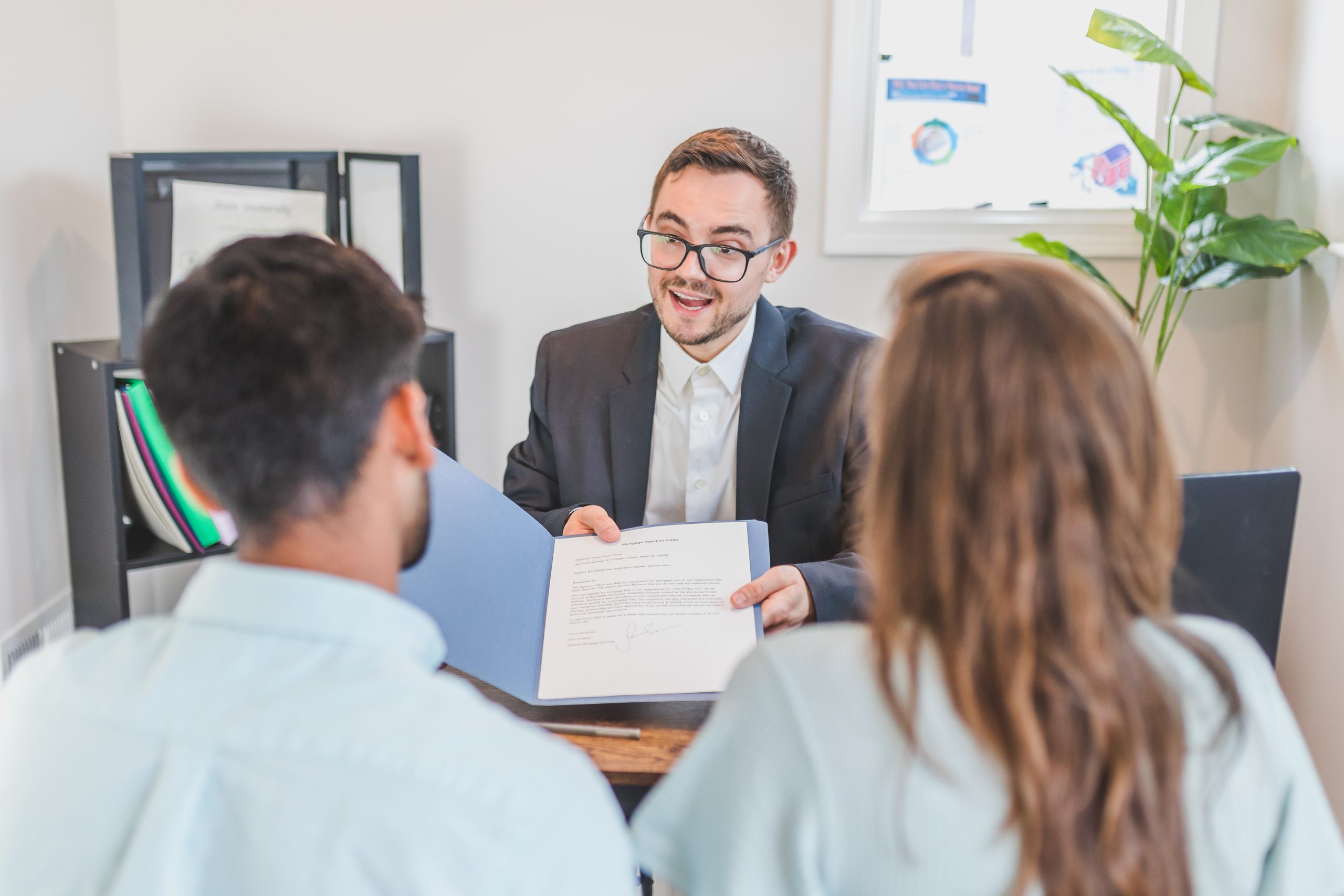 couple-looking-at-document